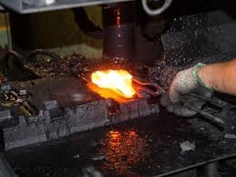 Flash trimmed and heat treated forging